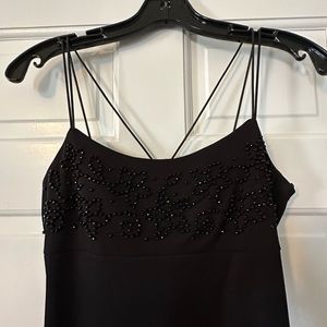 Pretty long black dress, beaded breast area. Great for a night out.💕